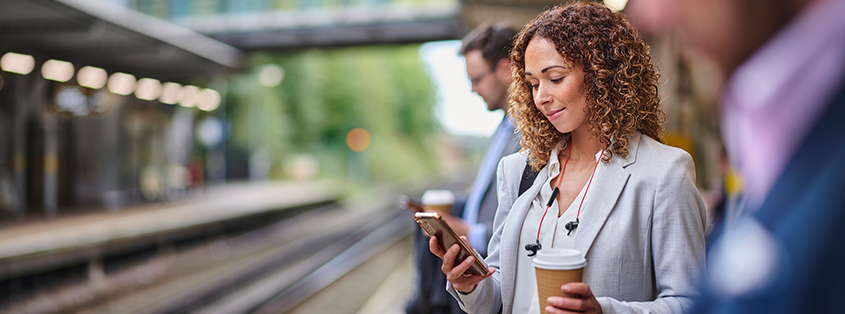 Woman smiling at her phone